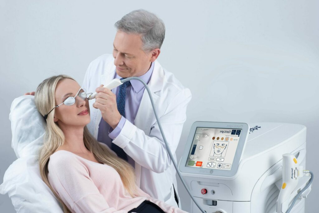 woman receiving OptiLight treatment